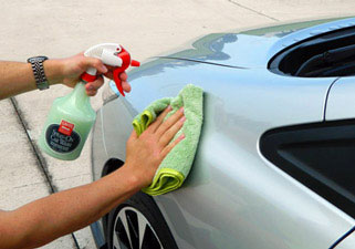Washing car with Griot's Waterless Car Wash and microfiber towels